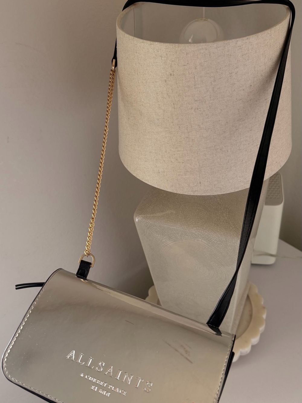 All Saints Silver Crossbody Bag with Black Strap and Gold Chain